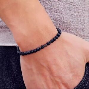 Blue Beaded Bracelet with Cross Accent.